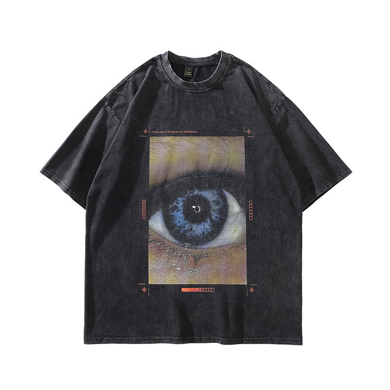 Black t-shirt with a graphic of an eye on a white background
